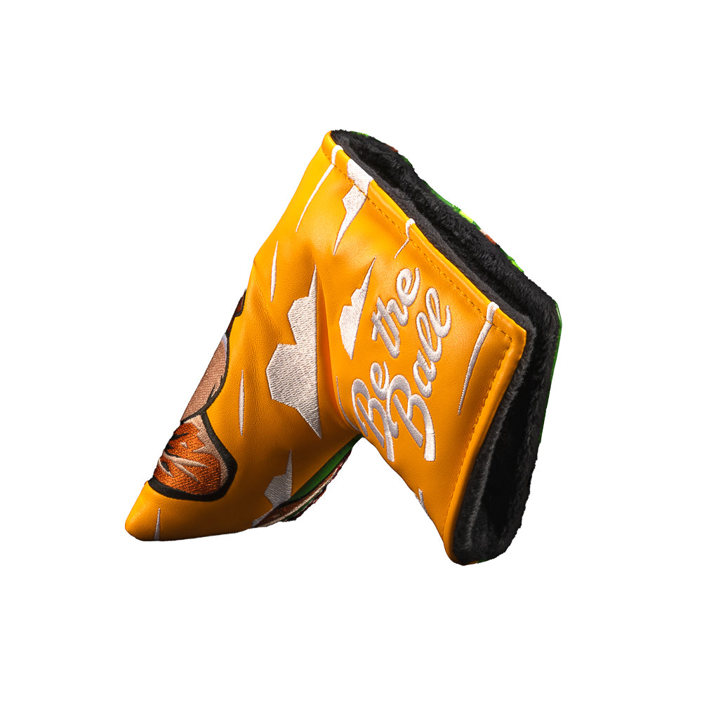 An orange Caddyshack official movie golf club headcover featuring a cartoon gopher illustration and the text 'Be the Ball' in white script, shown on a plain white background.