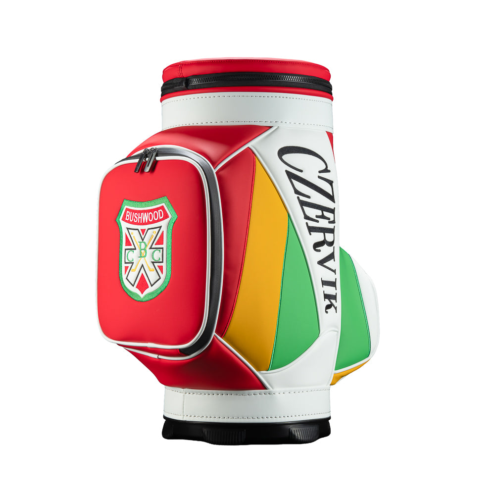 Rewind Golf Caddyshack Czervik Den Caddy Cooler with red, white, green, and yellow panels, vertical Czervik lettering, and a red zippered pocket with a Bushwood crest.