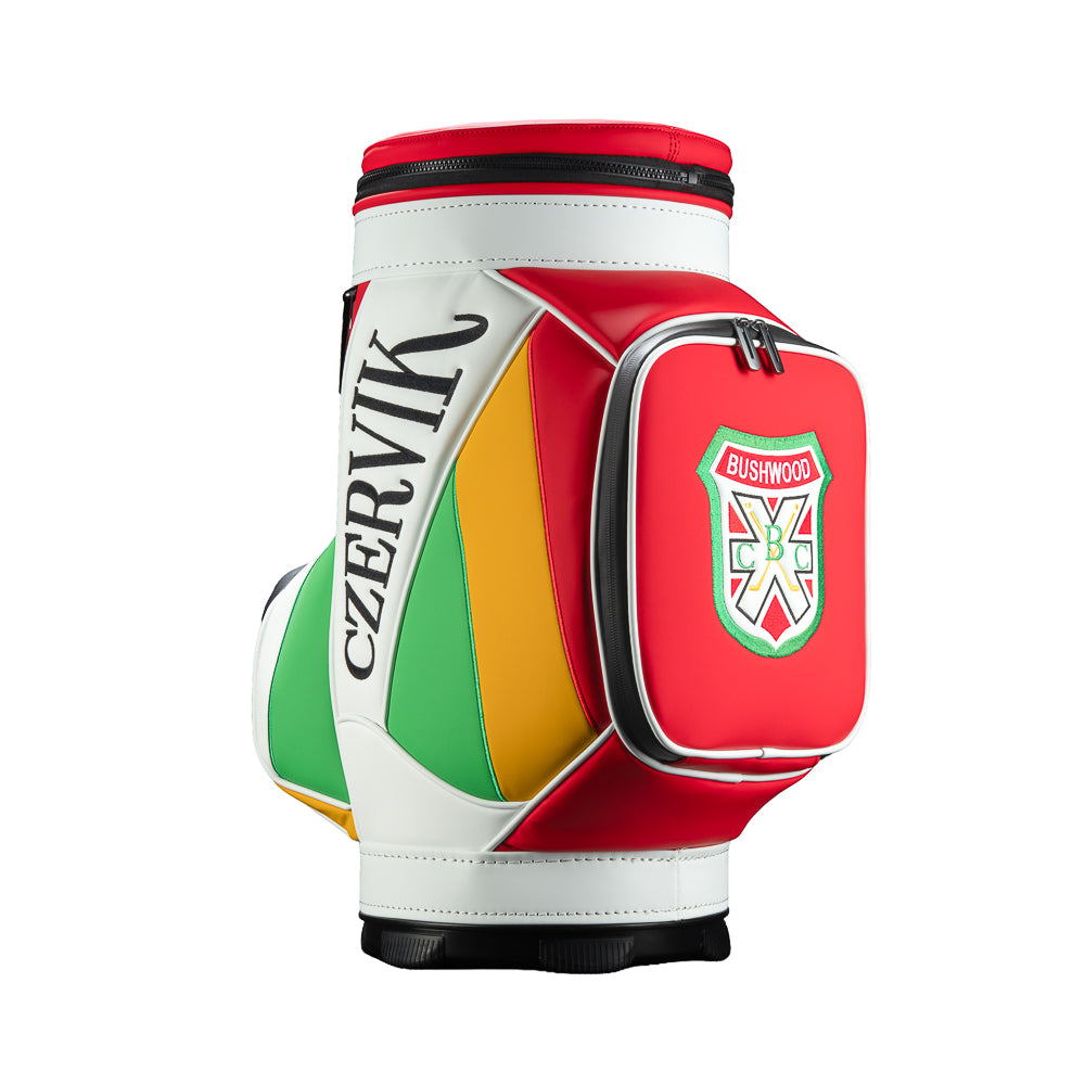 Rewind Golf Caddyshack Czervik Den Caddy Cooler with red, white, green, and yellow panels, vertical Czervik lettering, and a red zippered pocket with a Bushwood crest.