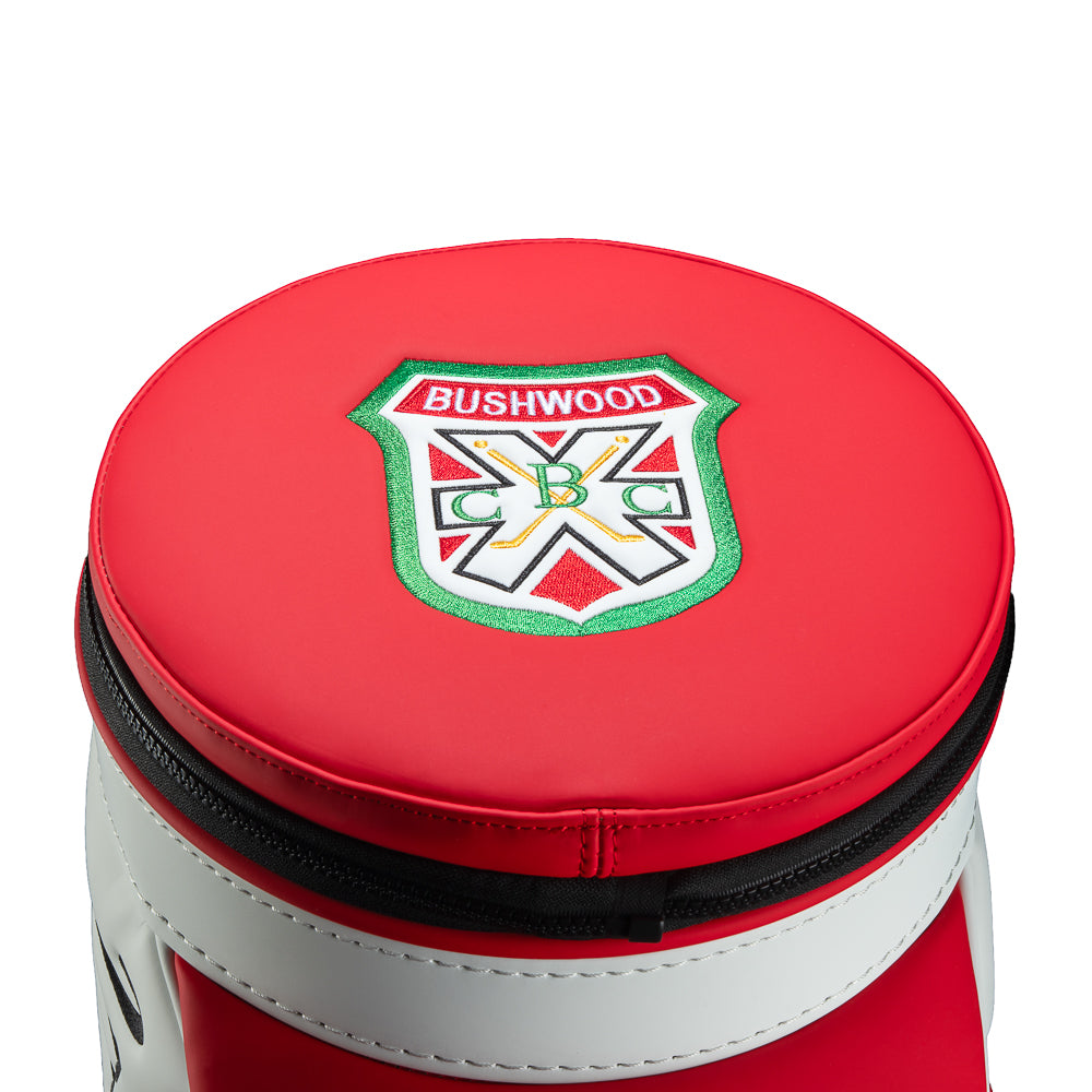 Rewind Golf Caddyshack Czervik Den Caddy Cooler with red, white, green, and yellow panels, vertical Czervik lettering, and a red zippered pocket with a Bushwood crest.