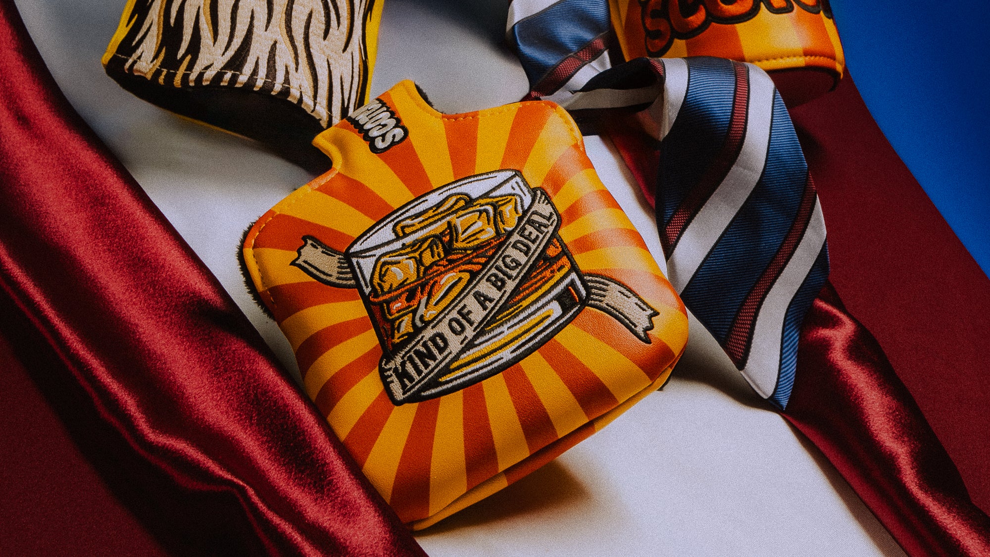Rewind Golf official Anchorman Legend of Ron Burgundy collection featuring wood and putter headcovers.