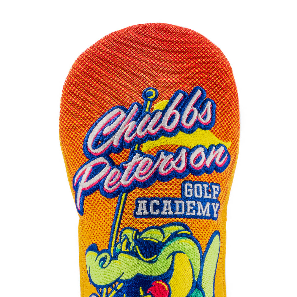 Rewind Golf x Happy Gilmore officially licensed Chubbs Peterson Golf Academy movie themed yellow and orange fairway wood golf headcover.