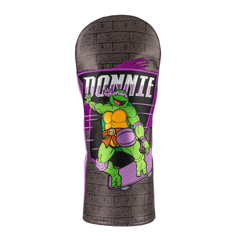 TMNT Donnie driver cover featuring bold purple and brick details. A classic Teenage Mutant Ninja Turtles Turtle Power style.